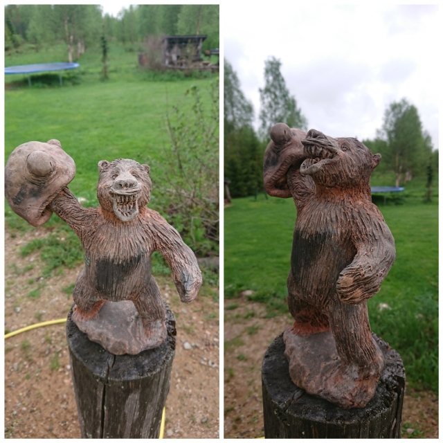 Ceramic brown bear sculpture that is attached to a potato that is eating bears hand. Back round is green. Finnish summer green.