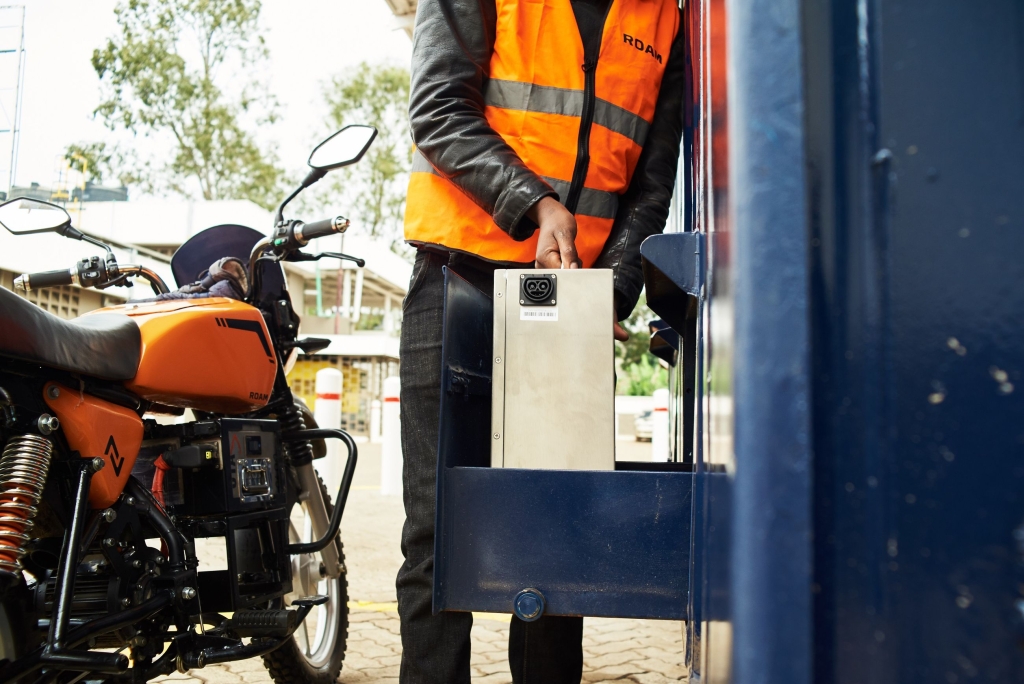 Roam Bike owner swapping bike battery